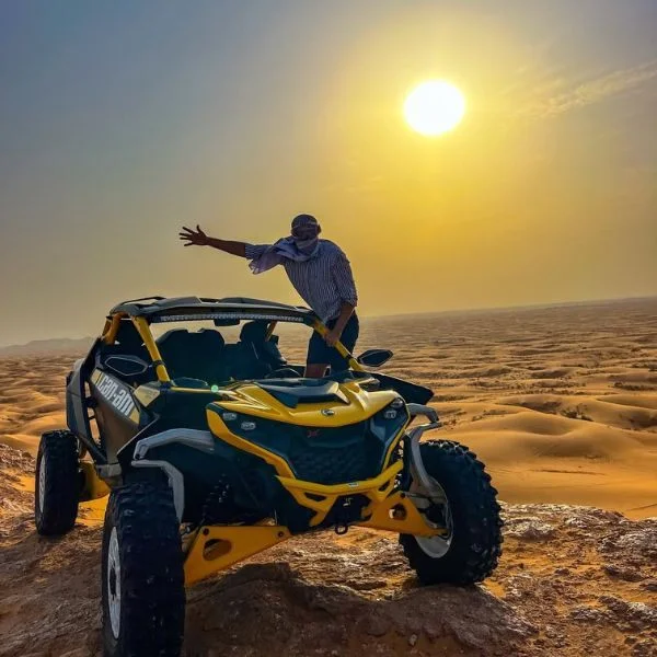 Can-Am Maverick R 240HP extreme performance dune buggy on Dubai desert red dunes