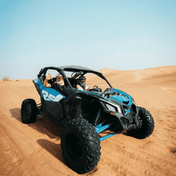 Can-Am Maverick X3 240HP performance dune buggy on Dubai desert red dunes