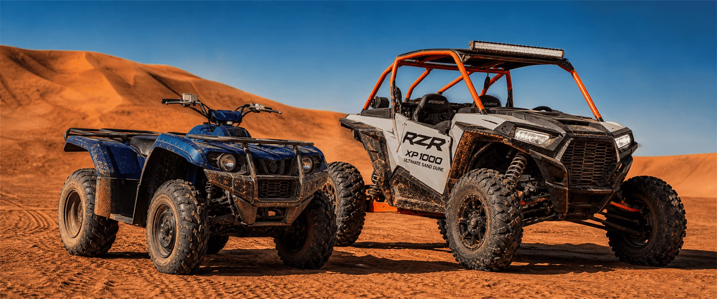 Dune Buggy and Quad Bike Stack Dubai — Yamaha Grizzly and Polaris RZR XP 1000 at 20% Off Yamaha Grizzly quad bike and Polaris RZR XP 1000 dune buggy side by side at Lahbab Desert base camp Dubai