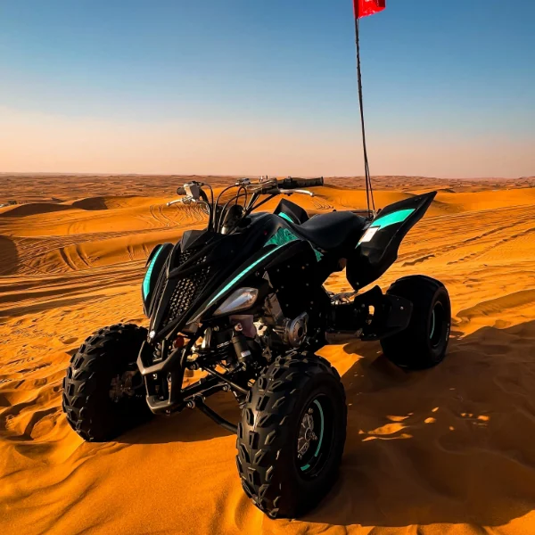 Raptor 700cc quad bike for open-desert riding on Dubai red dunes