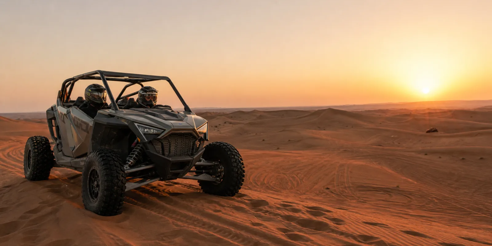 Sunrise dune buggy Dubai ride starting on Lahbab red dunes